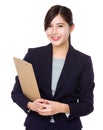 Asian young businesswoman hold with file board Royalty Free Stock Photo