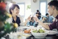 Asian young couple enjoying a romantic dinner evening drinks wh Royalty Free Stock Photo