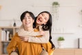 Asian young couple hugging with positive emotion and loving together at warmth place. Attractive man and woman embracing spending Royalty Free Stock Photo