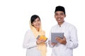 Asian young couple muslim using tablet pc