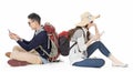 Asian young couple traveling and using mobile phone Royalty Free Stock Photo