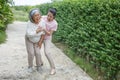 Asian young daughter caring for  sick senior mother To suffering chest pain or Heart attack at home . old mom suffering from Royalty Free Stock Photo