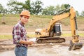 Young engineer working on site at the dam Royalty Free Stock Photo