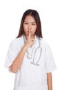 Asian young female doctor do quiet sign