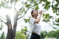 Asian young girl athlete drink bottle of water after exercise in park. Active attractive beautiful sportswoman take a break after Royalty Free Stock Photo