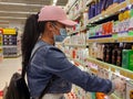 Young asian girl wearing face mask and protective equipment during COVID-19 pandemic