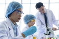 Asian young girl student scientist researching  and learning in a laboratory Royalty Free Stock Photo