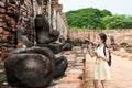 Asian young girl is study and learning antiquities,field trip,A Royalty Free Stock Photo