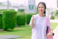Asian young girl teen student smiling with thumb up Royalty Free Stock Photo