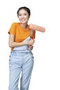 Asian young housewife holding roller paint brush Royalty Free Stock Photo