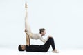 Asian Young Man and Caucasian Woman Performing As Ballet Dancers Over Grey in Studio During Suppots As Classical Dance Aesthetics Royalty Free Stock Photo