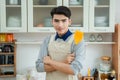 Asian young man is cooking Royalty Free Stock Photo