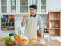 Asian young man is cooking Royalty Free Stock Photo