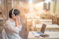 Asian young man with headphones listening to music Royalty Free Stock Photo