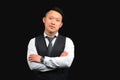 Asian young man stands on a black background Royalty Free Stock Photo