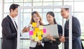 Asian young millennial professional successful male businessman and female businesswoman employee colleague in formal suit stand Royalty Free Stock Photo