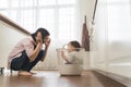 Asian Young Mother playing with her little son Royalty Free Stock Photo