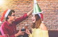 Asian young people enjoy Christmas parties on their holidays. Royalty Free Stock Photo