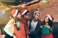 Asian young people enjoy Christmas parties on their holidays. Royalty Free Stock Photo