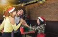 Asian young people enjoy Christmas parties on their holidays. Royalty Free Stock Photo