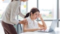 Asian young stressed depressed exhausted tired female businesswoman secretary working late overtime with laptop computer in office Royalty Free Stock Photo