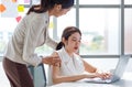 Asian young stressed depressed exhausted tired female businesswoman secretary working late overtime with laptop computer in office Royalty Free Stock Photo