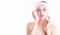 Asian young woman applying sheet mask on her beauty face. Attractive beautiful girl use moisturizer facial mask every week for Royalty Free Stock Photo