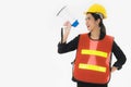 Asian young woman engineers Orange reflective safety vest for working safety and Yellow Safety helmet Standing and holding a