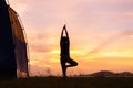 Asian young woman exercise and practice yoga sunset the relax nature background Royalty Free Stock Photo