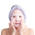 Asian young woman face, girl applying facial peel off mask Royalty Free Stock Photo