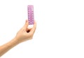 Asian young woman holding pack of contraceptive pills Royalty Free Stock Photo