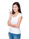 Asian young woman showing finger point up Royalty Free Stock Photo