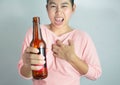 Asian young woman suffering from chest pain caused by heart disease from drink many alcohol. Dangerous lifestyle warning concept