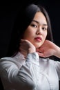 Asian young woman in white over black background. Black and Whit Royalty Free Stock Photo