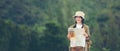 Asian young women holding map for check location adventure, tourism for destination leisure trips for education