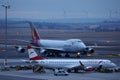 Asiana Airlines Jumbo and Austrian Jet on the apron