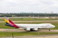 Asiana Cargo Boeing 747-446F Taxiing On Runway Of Tan Son Nhat International Airport, Vietnam. Royalty Free Stock Photo