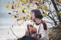 Asian girl playing the guitar.Country Western Musician Royalty Free Stock Photo