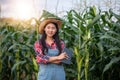 Asias women Agronomist and farmer  Using Technology for inspecting in Agricultural Corn Field Royalty Free Stock Photo