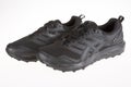 Asics logo brand and sign of Japanese multinational corporation on sporty black shoes