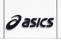 Asics logo on a wall Royalty Free Stock Photo