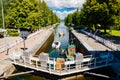 Asikkala, Finland - 16 July 2020: Vaaksy Canal between two big lakes Vesijarvi and Paijanne. Gateway is open for boats going Royalty Free Stock Photo