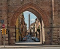 Asinelli tower (Bologna, Italy) from a medieval gate