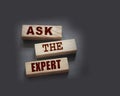 Ask the Expert words on wooden blocks. Consulting a professional  master or consultant for a solution and advice business concept Royalty Free Stock Photo