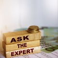 Ask the Expert words on wooden blocks. Consulting a professional, master or consultant for a solution and advice business concept Royalty Free Stock Photo
