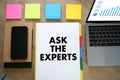 ASK THE EXPERTS man touch bar search and Two Businessman working at office desk and using a digital touch screen tablet and use Royalty Free Stock Photo