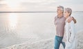 They always ask how we are still this in love...a mature couple spending the day at the beach. Royalty Free Stock Photo