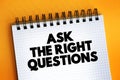 Ask The Right Questions text on notepad, concept background Royalty Free Stock Photo