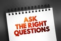 Ask The Right Questions text on notepad, concept background Royalty Free Stock Photo