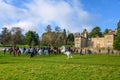 Young children sat on horses in an English countryside setting, waiting for the fox hunt to begin Royalty Free Stock Photo